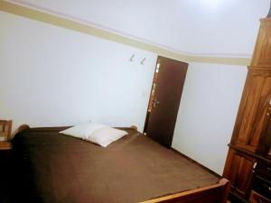 Ένα ή περισσότερα κρεβάτια σε δωμάτιο στο Wasi +2 φωτογραφίες