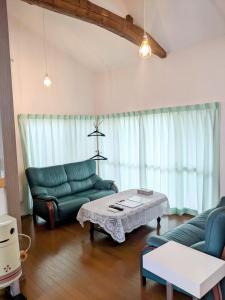 Ένα ή περισσότερα κρεβάτια σε δωμάτιο στο ぷらっと赤見