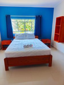 Giường trong phòng chung tại Alojamiento Oslo San Ramón +17 ảnh