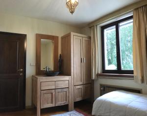 Postel nebo postele na pokoji v ubytování La Lune d'Or
