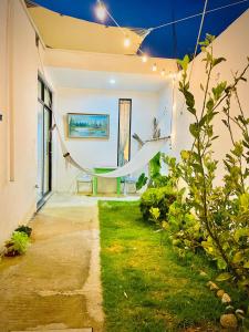 een kamer met een hangmat in een huis bij Loft Industrial Petfriendly in Tlaxcala de Xicohténcatl +42 foto's