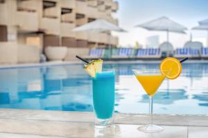 Bazén v ubytování Radisson Blu Hotel, Dubai Deira Creek nebo v jeho okolí