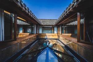 Swimmingpoolen hos eller tæt på Huangshan Bajiazhan Yulin Yuchi Homestay