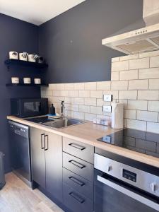 Køkken eller tekøkken på Meraki Guesthouse