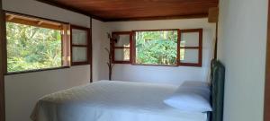 En eller flere senge i et værelse på Casa Vista Mar