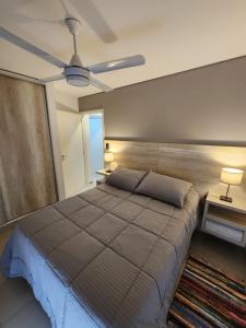 En eller flere senge i et værelse på Civis Tower Excepcional Departamento