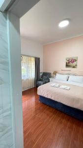 Postel nebo postele na pokoji v ubytování Major Innes Motel