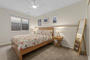 Giường trong phòng chung tại Sunnyside Haven