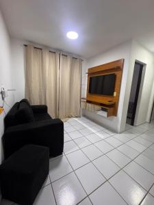 Et tv og/eller underholdning på Ap 1km da praia com suite + 5 billeder