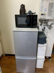 Kuchyň nebo kuchyňský kout v ubytování Odori Park Soba Sapporo, Susuki Convenient for sightseeing 1R Highway 702