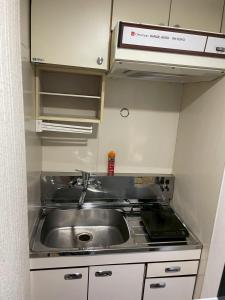 Kuchyň nebo kuchyňský kout v ubytování Odori Park Soba Sapporo, Susuki Convenient for sightseeing 1R Highway 702