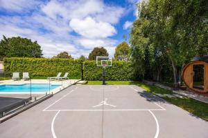 an outdoor basketball court with a basketball hoop at Play on Balcombe in Mount Martha