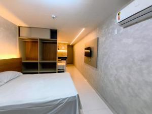 En eller flere senge i et værelse på Victory Preminum