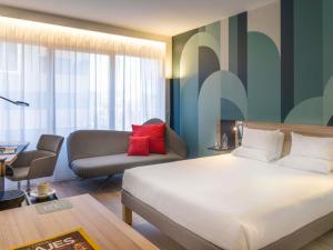 Postel nebo postele na pokoji v ubytování Novotel Campo De Las Naciones + 207 fotografií