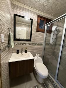 Et badeværelse på Complejo Bosque Escondido