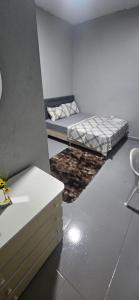 Giường trong phòng chung tại Boa opção