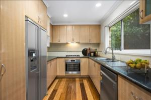 Køkken eller tekøkken på Birdsong Central, North Beach