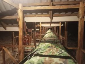 a inside view of a room with a tent at Phathokcamping in Ban Phathok