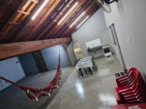 Et opholdsområde på Casa Alves Aluguel de Temporada Próx Hospital do Amor em Barretos SP Com Suíte e Ar condicionado