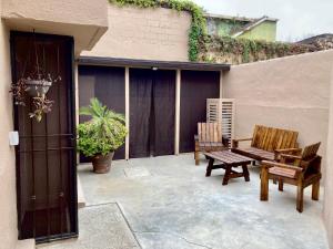 Patio nebo venkovní prostory v ubytování Golden House