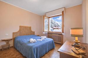 En eller flere senge i et værelse på La Casa Di Felice - Happy Rentals