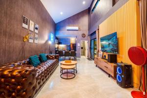 Et opholdsområde på The Connect Pool Villa Cha Am