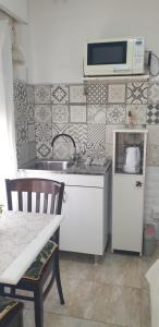 Η κουζίνα ή μικρή κουζίνα στο Minidpto