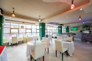 Et tv og/eller underholdning på Capital Comfort Hotel Ambala Road