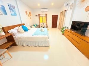 Et tv og/eller underholdning på Cozy Tropical