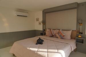 En eller flere senge i et værelse på Residy Hideaway