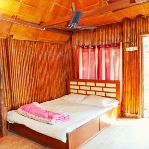 Postel nebo postele na pokoji v ubytování Divine Lake Island