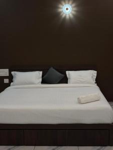 Postel nebo postele na pokoji v ubytování Zeekka Tourist Home