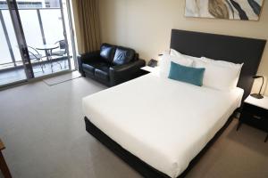 En eller flere senge i et værelse på Bridges on Argyle