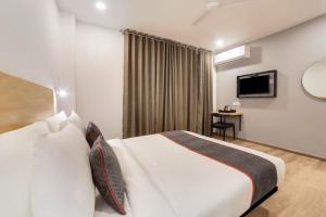 Et tv og/eller underholdning på Townhouse Alwar Railway Junction