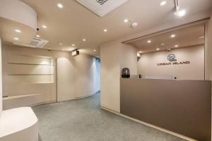 a lobby with a counter in a room at Daebudo Urban Island in Ansan +8 photos