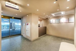 an empty room with a view of a room break room at Daebudo Urban Island in Ansan