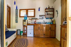 Nhà bếp/bếp nhỏ tại Gecko Cottage