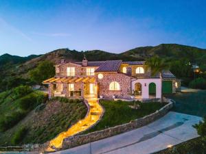 an estate in the hills with a mansion at Mintcello Estate in Malibu