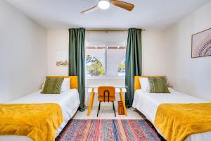 En eller flere senge i et værelse på Welcome to Casa Hunuvat