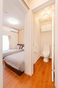 Et badeværelse på KAKURE Yahiro 3-Chome New 2LDK House,Washer-Dryer & Free Parking,1 Stop to Skytree