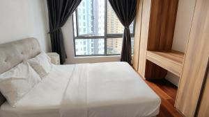 En eller flere senge i et værelse på Pomelo Meet Kuala Lumpur + 28 billeder