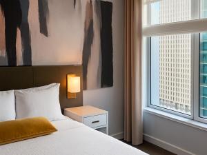 En eller flere senge i et værelse på The Central at 5th, a Hilton Club - STUDIO STD