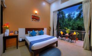 En eller flere senge i et værelse på Foxoso Sonnet, Anjuna Goa