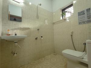 Koupelna v ubytování Shamak Homestay Varkala