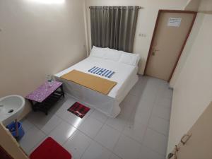 En eller flere senge i et værelse på Ambai Guest House + 42 billeder