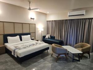 En eller flere senge i et værelse på Dhartii RiverView Resort + 61 billeder