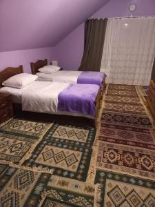 En eller flere senge i et værelse på Sakartvelo Soul