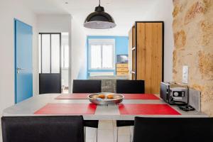 Kuchyň nebo kuchyňský kout v ubytování Proche Puy du Fou - Petite maison tendance loft