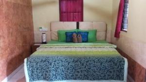 Postel nebo postele na pokoji v ubytování Santun Homestay