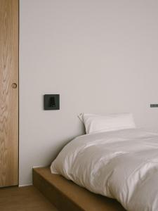 En eller flere senge i et værelse på YALDA apartment + 33 billeder